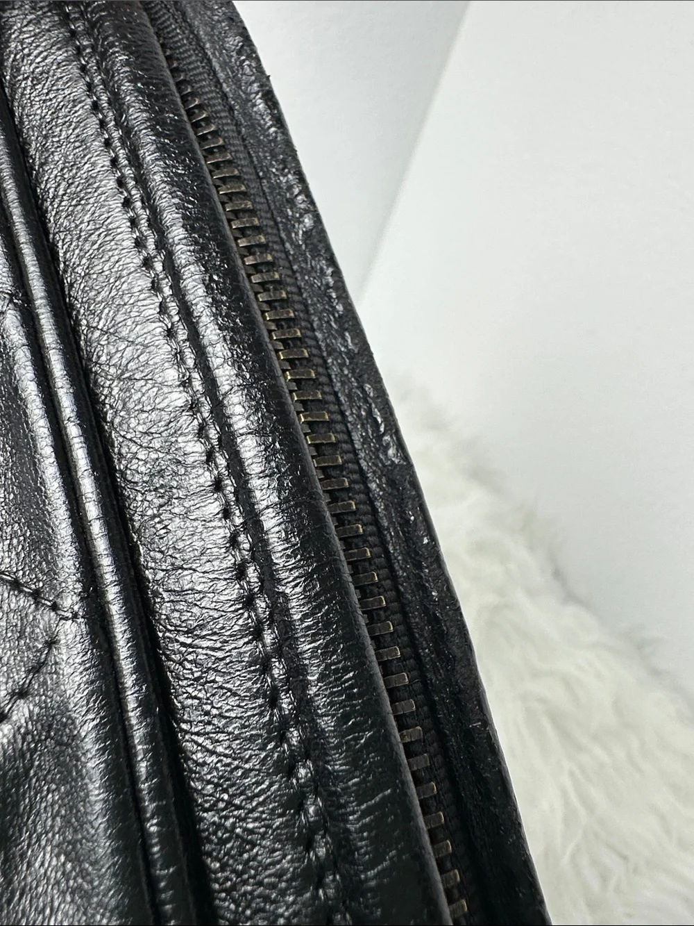 CHANEL Black Quilted Lambskin Crossbody with Tassel and Chain
